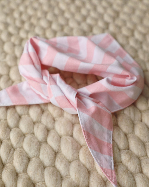 Classic stripe dog bandana with a cheerful pink twist