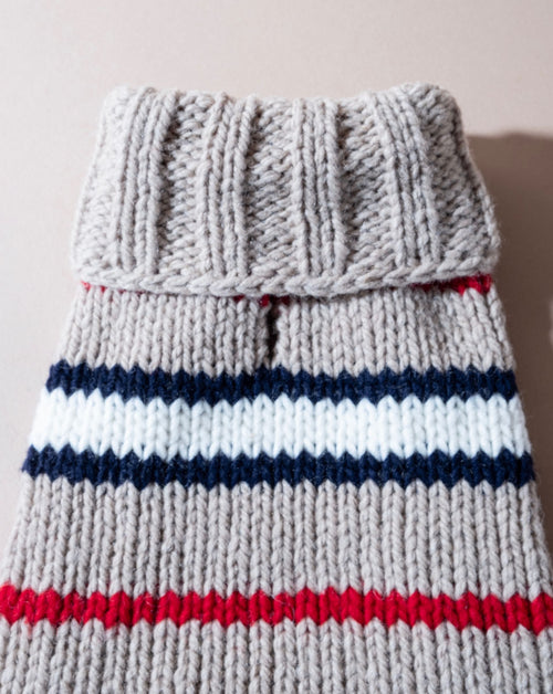 Cozy tan striped alpaca sweater for dogs, perfect for chilly days.