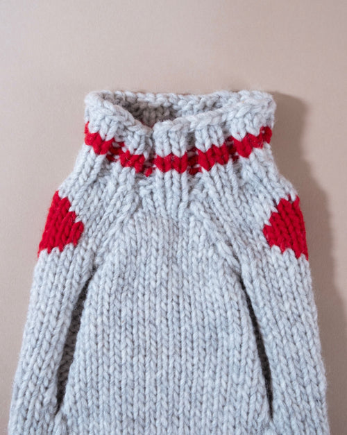 Cozy red heart-patterned sweater for your dog, ideal for smaller breeds like Shih Tzus and French Bulldogs