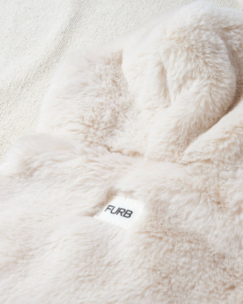 the total package: insanely touchable, wildly soft, hooded, and totally reversible. Thoughtful details and a chic design make this an instant classic, and when you realize the reverse side is just as cute, you&