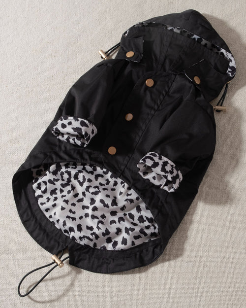 black dog raincoat with leopard print lining and removable hood. frenchie rain coat