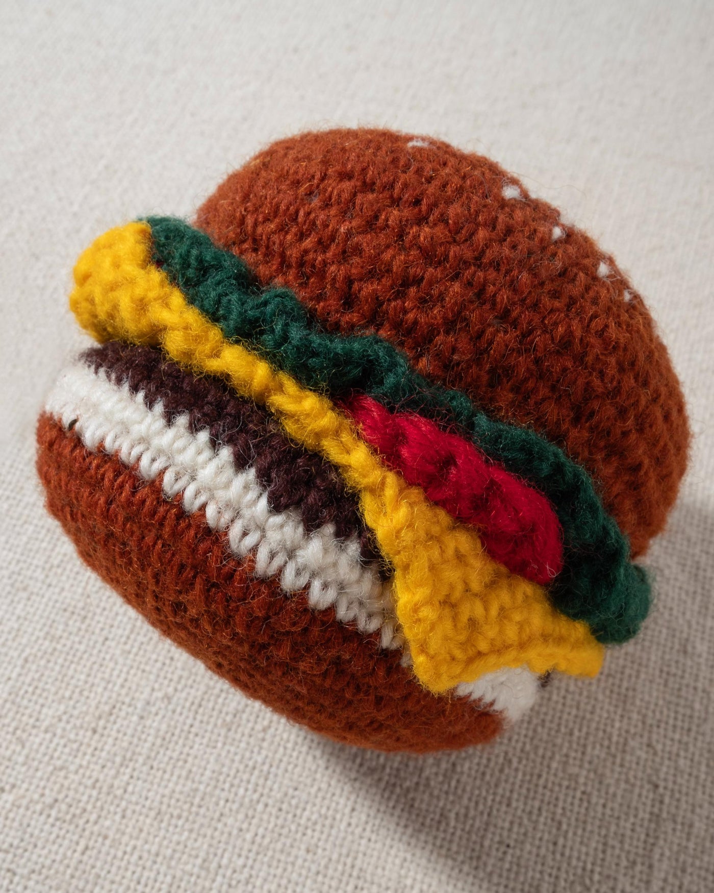 hand knit crochet brown hamburger dog toy