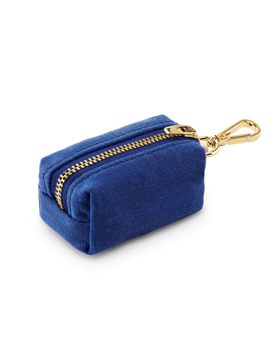 Waxed blue cotton canvas is complete with elevated brass hardware. Sleek clasp easily attaches to your leash's O ring. There's no mess left behind with this adorable accessory.
