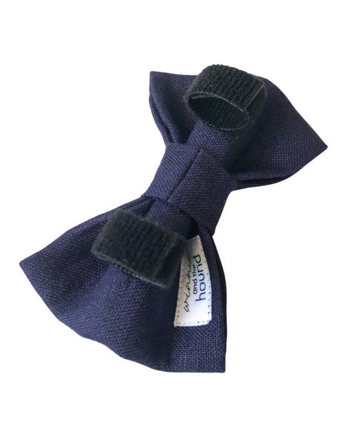 Stylish navy linen bow tie, a perfect addition to your dog’s formal look.