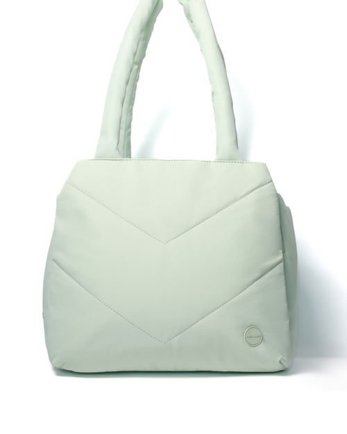 Mint pet carrier tote for easy travel with small to medium dogs like Cocker Spaniels and Bulldogs.