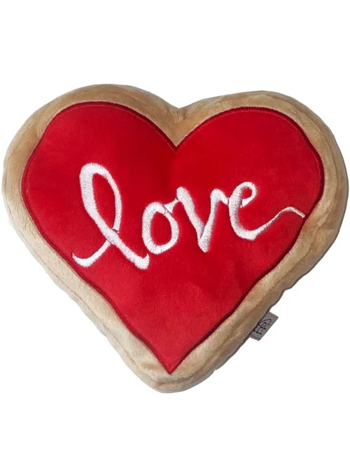 Plush sugar cookie dog toy for interactive play.
Cute sugar cookie shaped dog toy for all breeds.