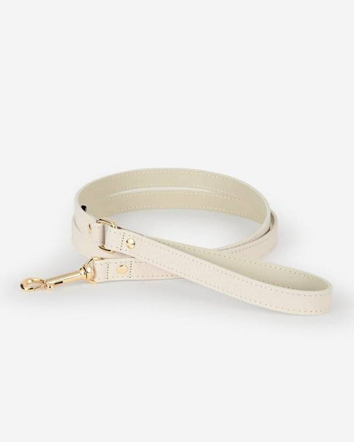 Elegant ivory leather dog leash, a premium accessory for walking your pup in style