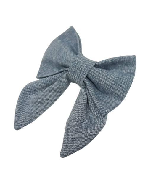 Blue chambray denim bow for small to medium dog breeds, adding a trendy, sophisticated style to your pup&