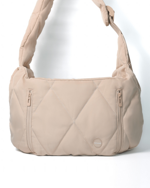 Chic Nude Quilted Crossbody Pet Carrier - Travel in style with this sleek pet carrier.
