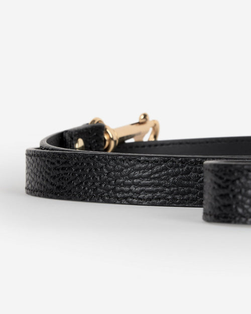 Close-up of Nara black leather dog leash showing stitching and leather texture