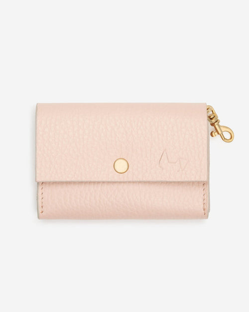 Rocco blush pink leather dog waste bag holder, front view, stylish pet accessory