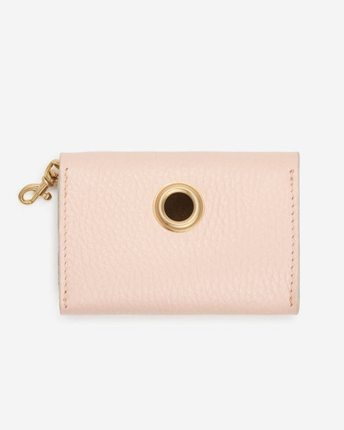 Back view of Rocco light pink leather dog waste bag holder, functional and chic