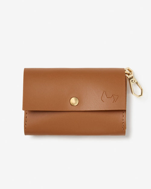 Rocco camel leather dog waste bag holder, front view, elegant pet accessory