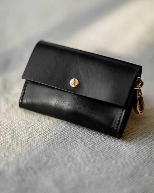 Full view of black studded leather collar and leash kit for small dogs, secure and stylish for everyday walks