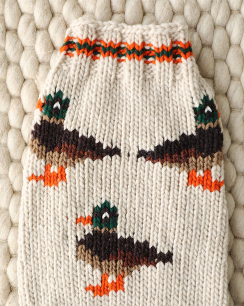 Cozy wool dog sweater with duck design, breathable and warm knit for outdoor adventures and lounging