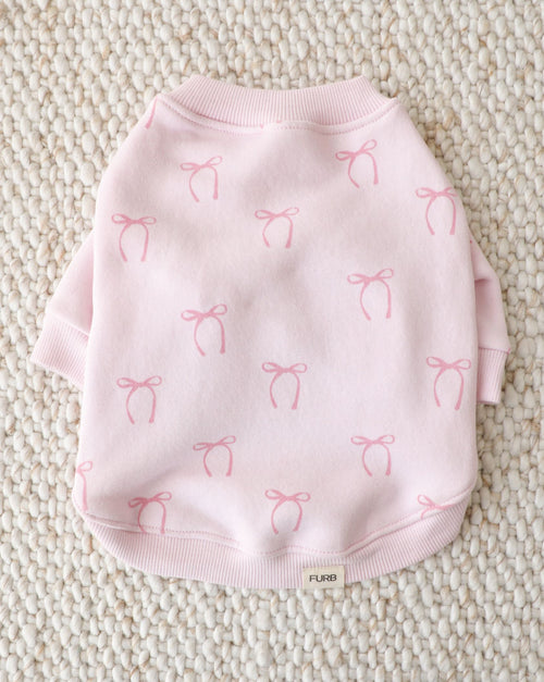 pink dog sweatshirt with bow print, soft cozy pet clothing for cute everyday outfits