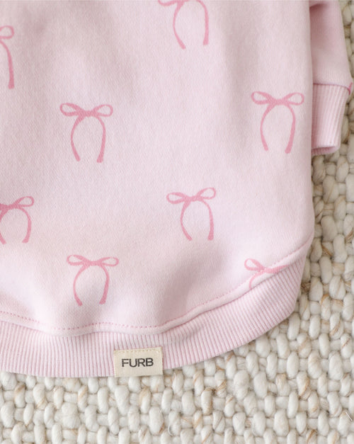 soft pink dog clothing with playful bow design, comfortable apparel for everyday wear