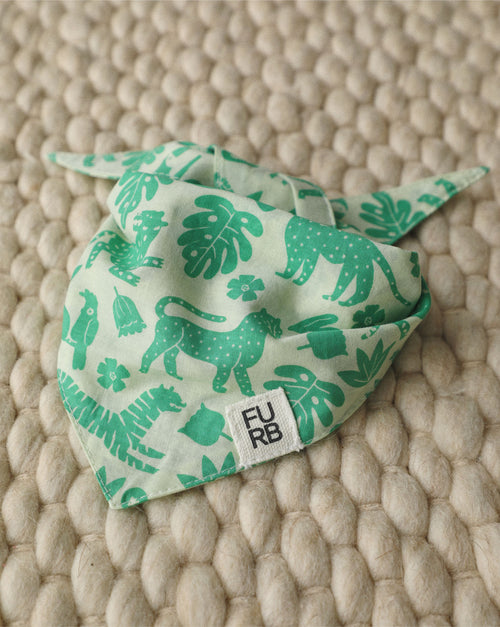 Bold green bandana for dogs with a wild side