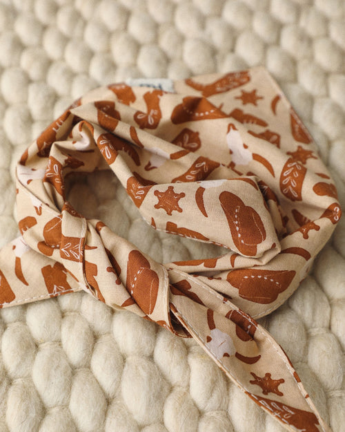 Brown western dog bandana with classic detailing – ideal for Cavalier King Charles Spaniels or similar-sized pups