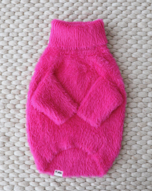 Bright hot pink eyelash knit dog sweater, soft and fashionable for playful pups.