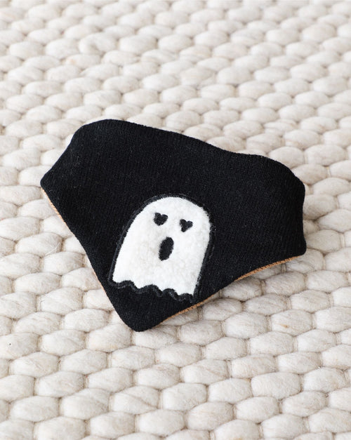 Cute reversible Halloween-themed dog bandana for small pets.