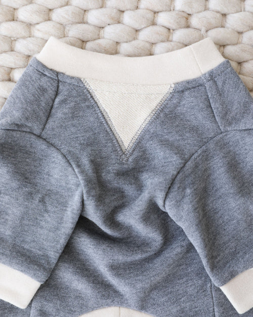 Close-up of charcoal dog sweatshirt texture highlighting soft, cozy knit fabric.