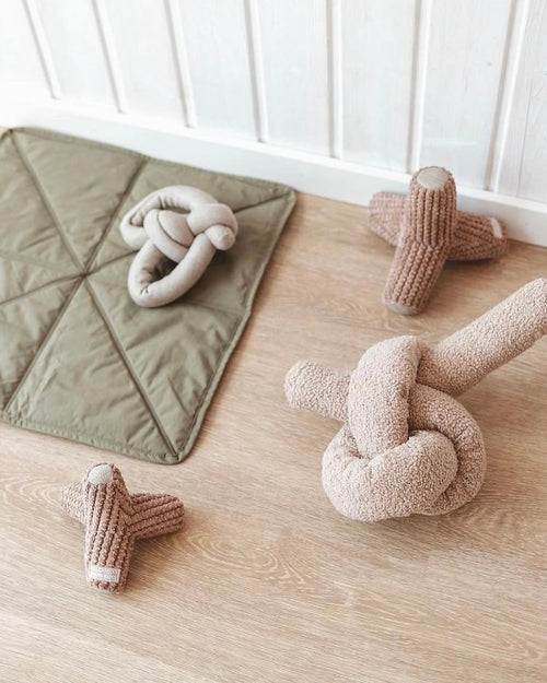 Squeaky taupe plush dog toy with textured crinkle arms – ideal for interactive play