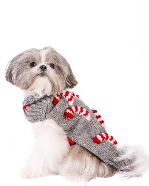 Festive knit sweater for small dogs in candy cane stripe pattern.