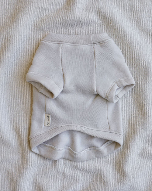 Cute Pink Bow Dog Sweatshirt featuring a lovely bow design, ideal for keeping your dog cozy while looking fashionable.