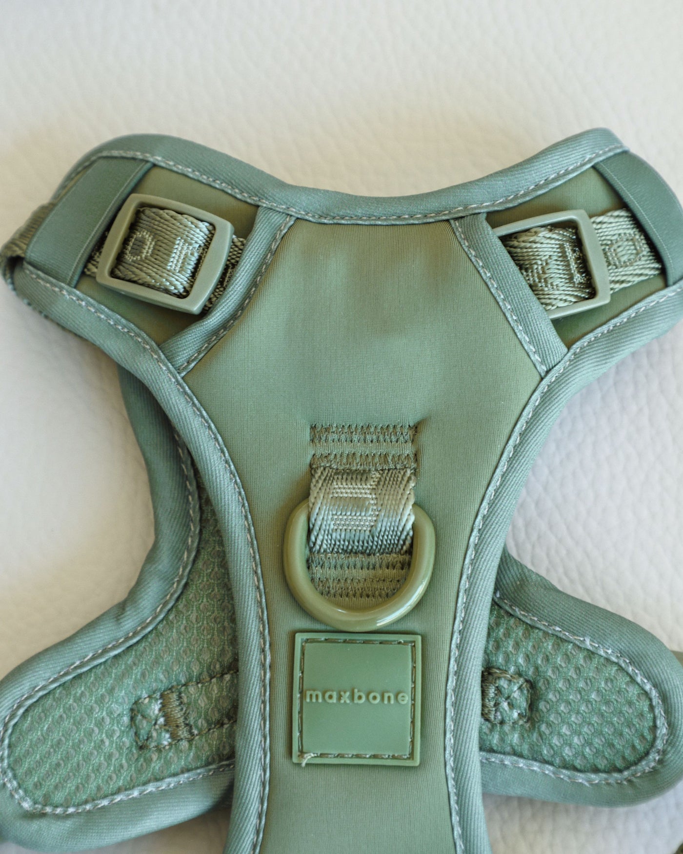 flat shot of sage green super soft nylon harness by maxbone