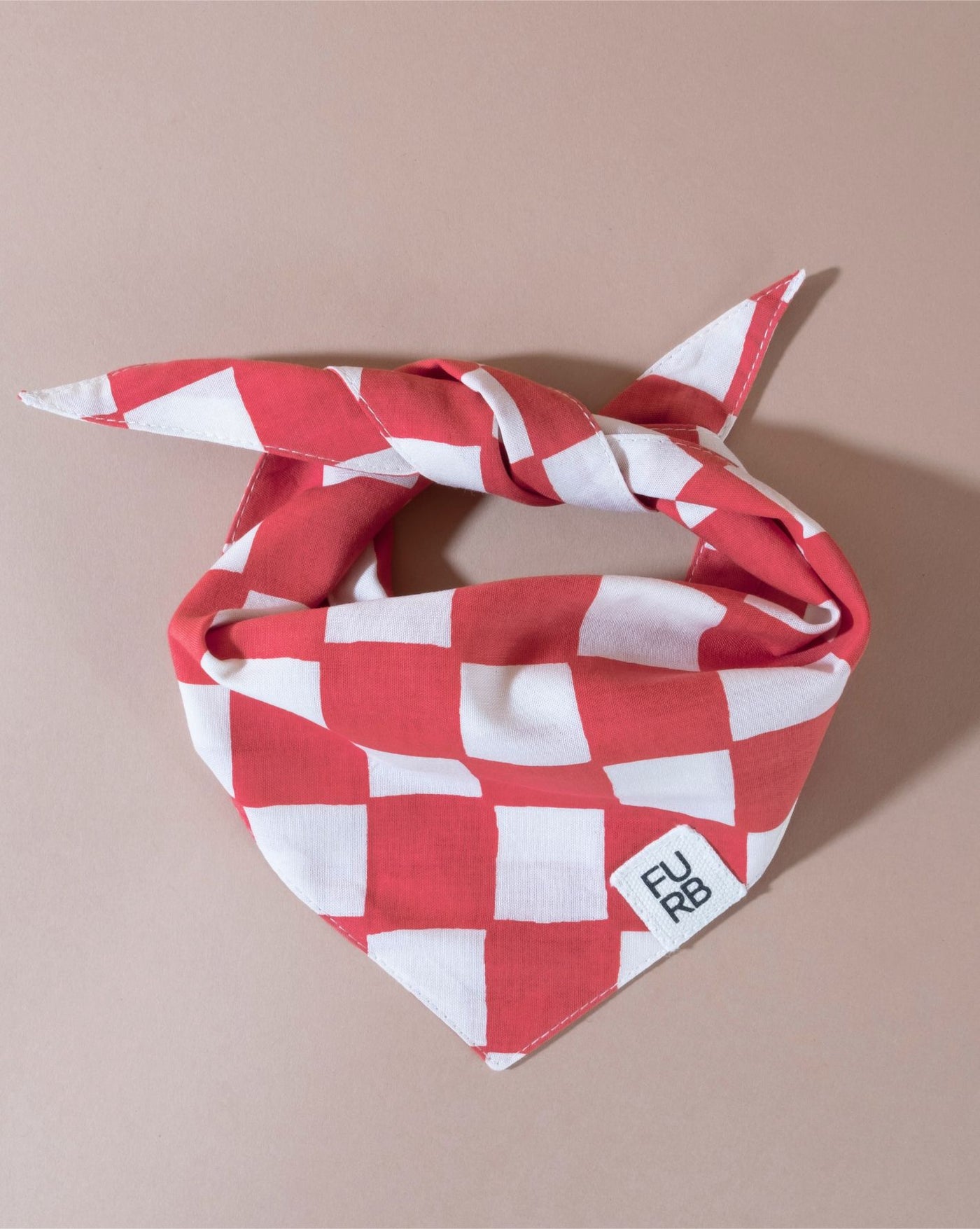 Red checkered dog bandana with a fashionable furb logo.