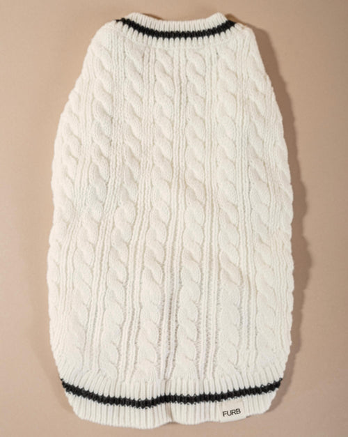 Chic ivory cable knit sweater vest for small and medium dogs, an essential wardrobe item for cooler days.