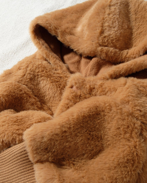 the total package: insanely touchable, wildly soft, hooded, and totally reversible. Thoughtful details and a chic design make this an instant classic, and when you realize the reverse side is just as cute, you&