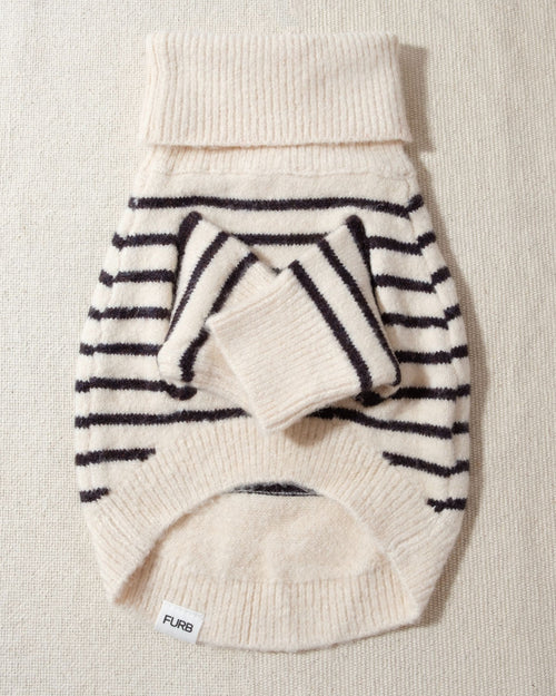 a striped dream, with a comfy ivory knit body covered in thin black stripes, and perfect ribbed ivory turtleneck with coordinating sleeves. The long turtleneck folds over as a toasty touch, and sleeves can be cuffed for a more casual vibe mini chihuahua clothes