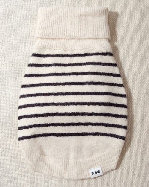 a striped dream, with a comfy ivory knit body covered in thin black stripes, and perfect ribbed ivory turtleneck with coordinating sleeves. The long turtleneck folds over as a toasty touch, and sleeves can be cuffed for a more casual vibe miniature poodle clothes