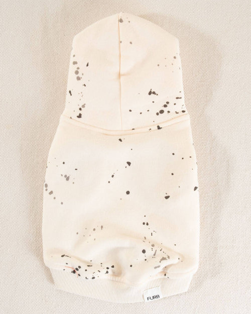 Unique ivory dog hoodie with an artistic paint splatter design for small and medium breed dogs.