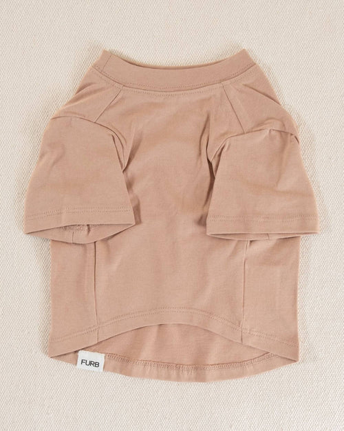 Relaxed tan dog t-shirt, perfect for warm days, offering comfort and style for your furry friend.