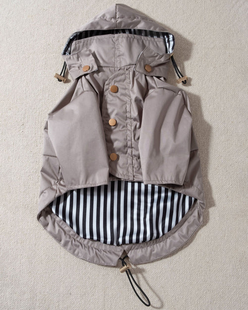 taupe dog raincoat with striped lining and removable hood. frenchie rain jacket 