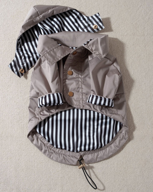 taupe dog raincoat with striped lining and removable hood. pug rain jacket 