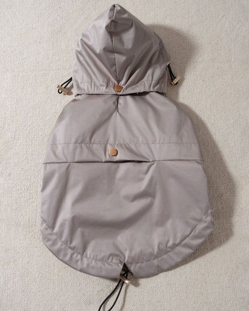 taupe dog raincoat with striped lining and removable hood. corgi rain jacket 