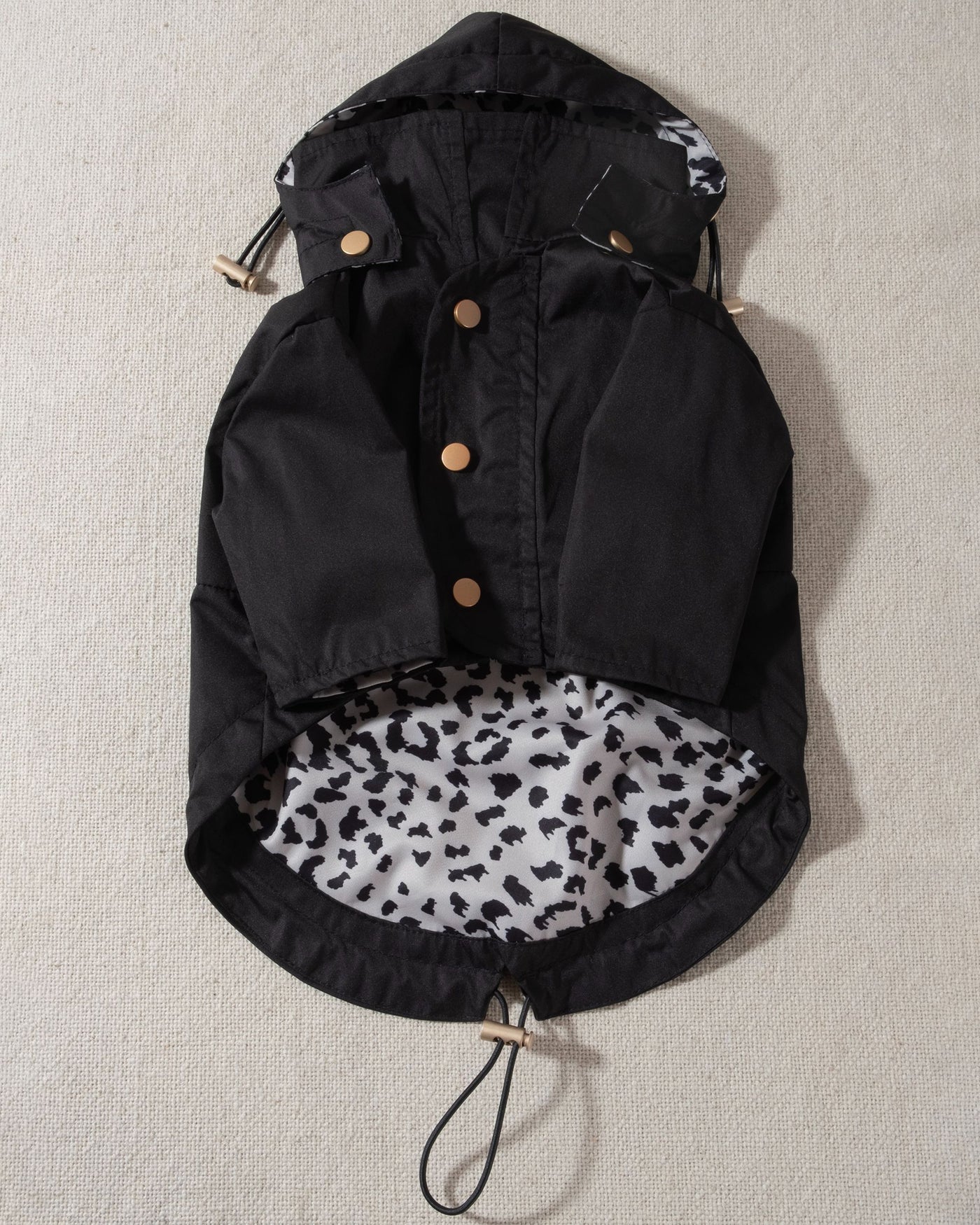 black dog raincoat with leopard print lining and removable hood