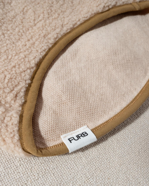 A dreamy tan sherpa bottom half accents a super soft ivory fleece top half, with tan buttons halfway down the placket of this cozy pullover. Tan trim on the cuffs, neck, and bottom hem add the perfect finishing touch for the ultimate street style.. fleece sweaters for standard poodles 