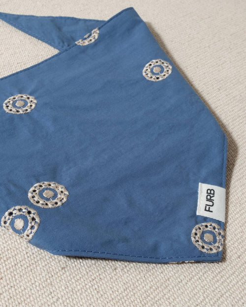 blue dog bandana with white embroidery and tasteful furb logo