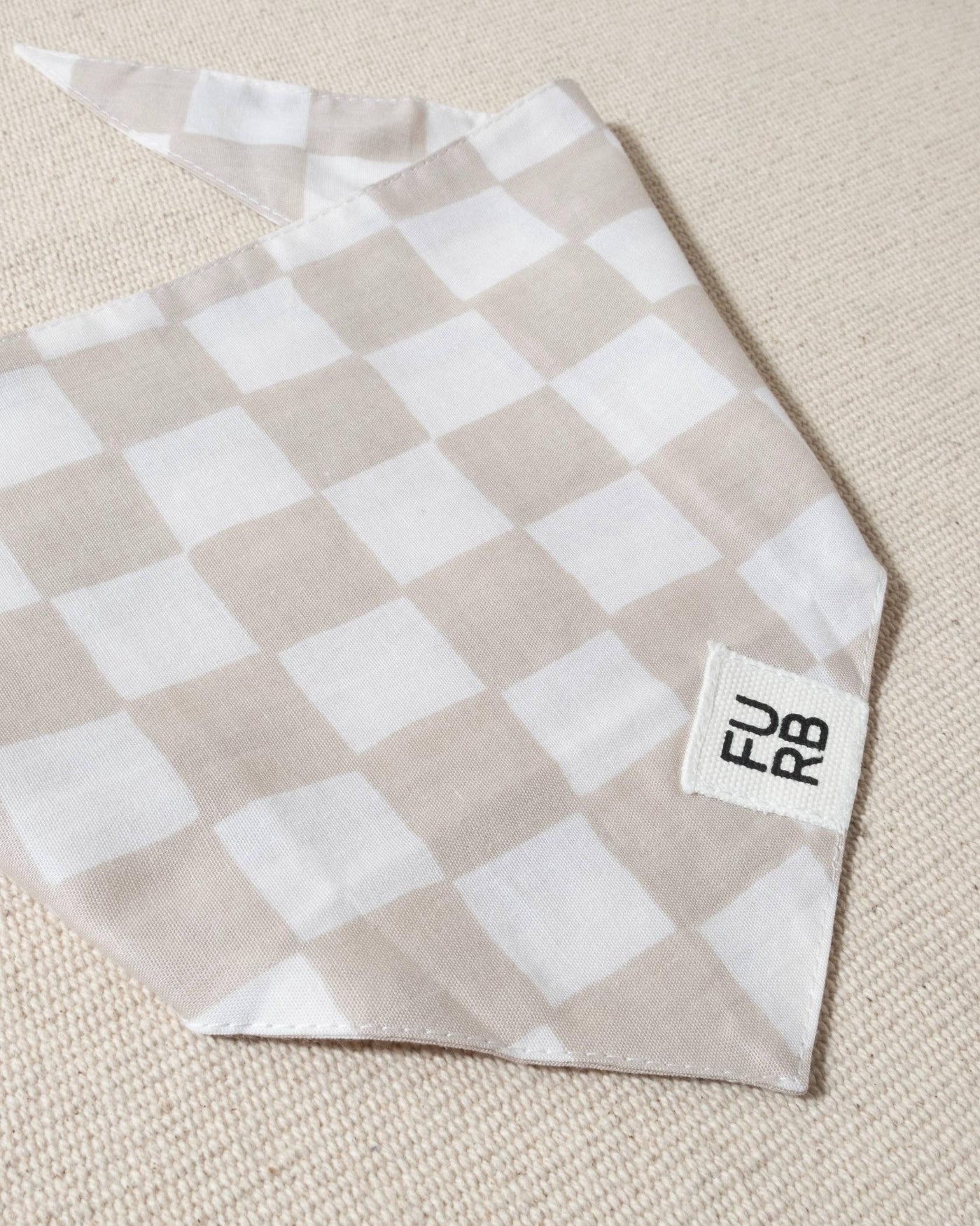 light tan and white check dog bandana with tasteful furb tag