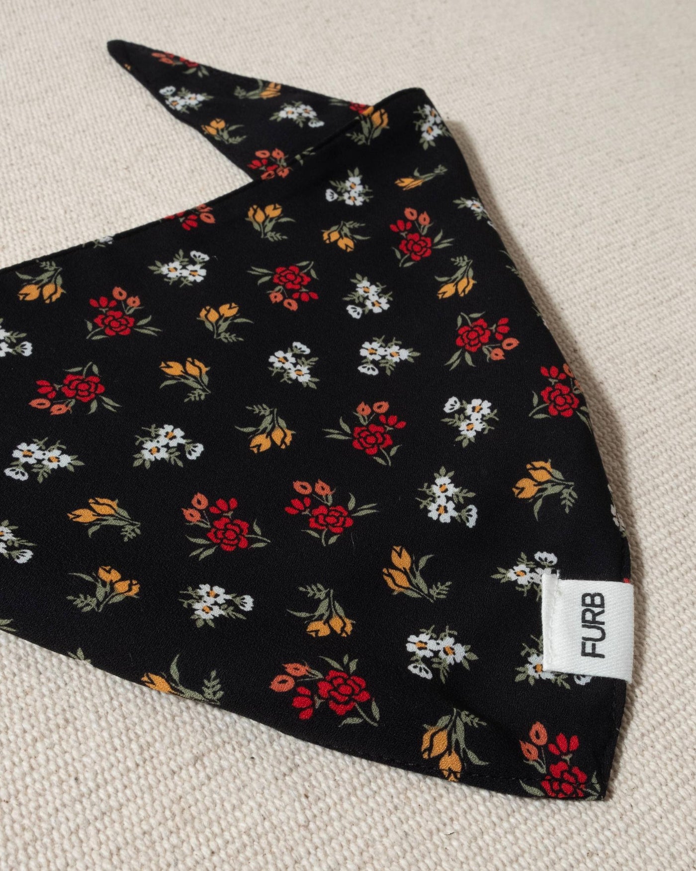 black dog bandana with multi floral print and tasteful furb tag