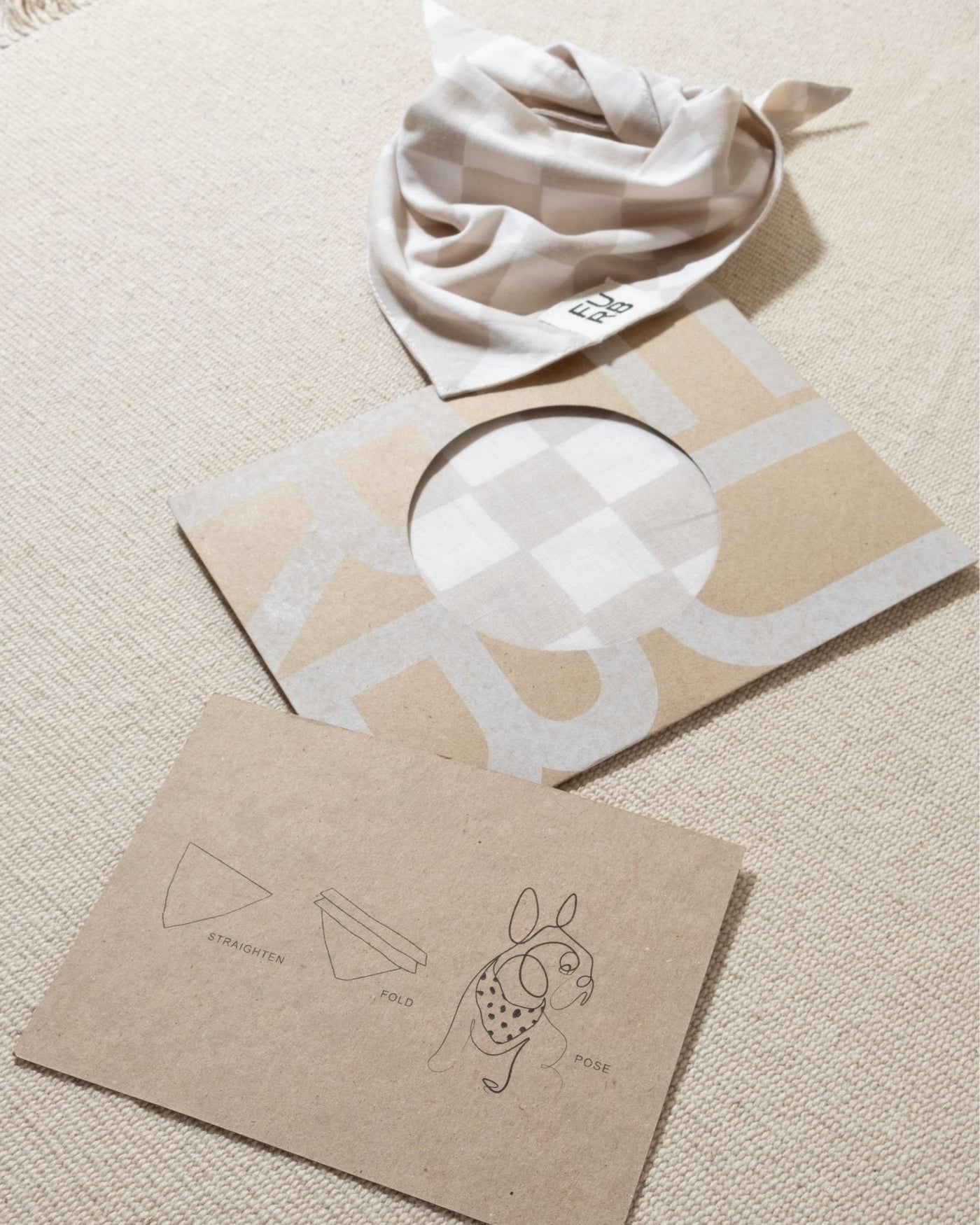 Tan and white check dog bandana, a must-have accessory for fashion-forward pups.