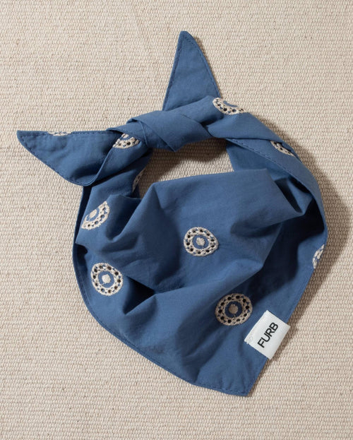 blue dog bandana with white embroidery and tasteful furb logo