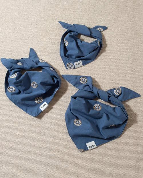 blue dog bandana with white embroidery and tasteful furb logo