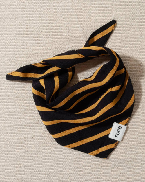 Black and gold striped dog bandana, ideal for adding a chic and modern touch to your dog’s outfit.