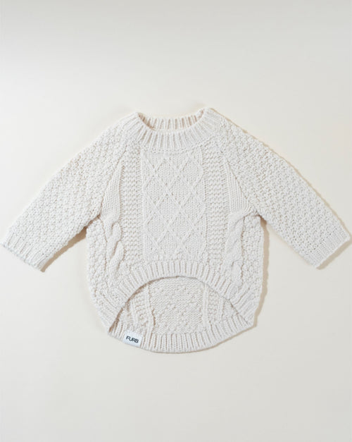 Cozy ivory cable knit dog sweater for stylish pups, perfect for fall and winter.